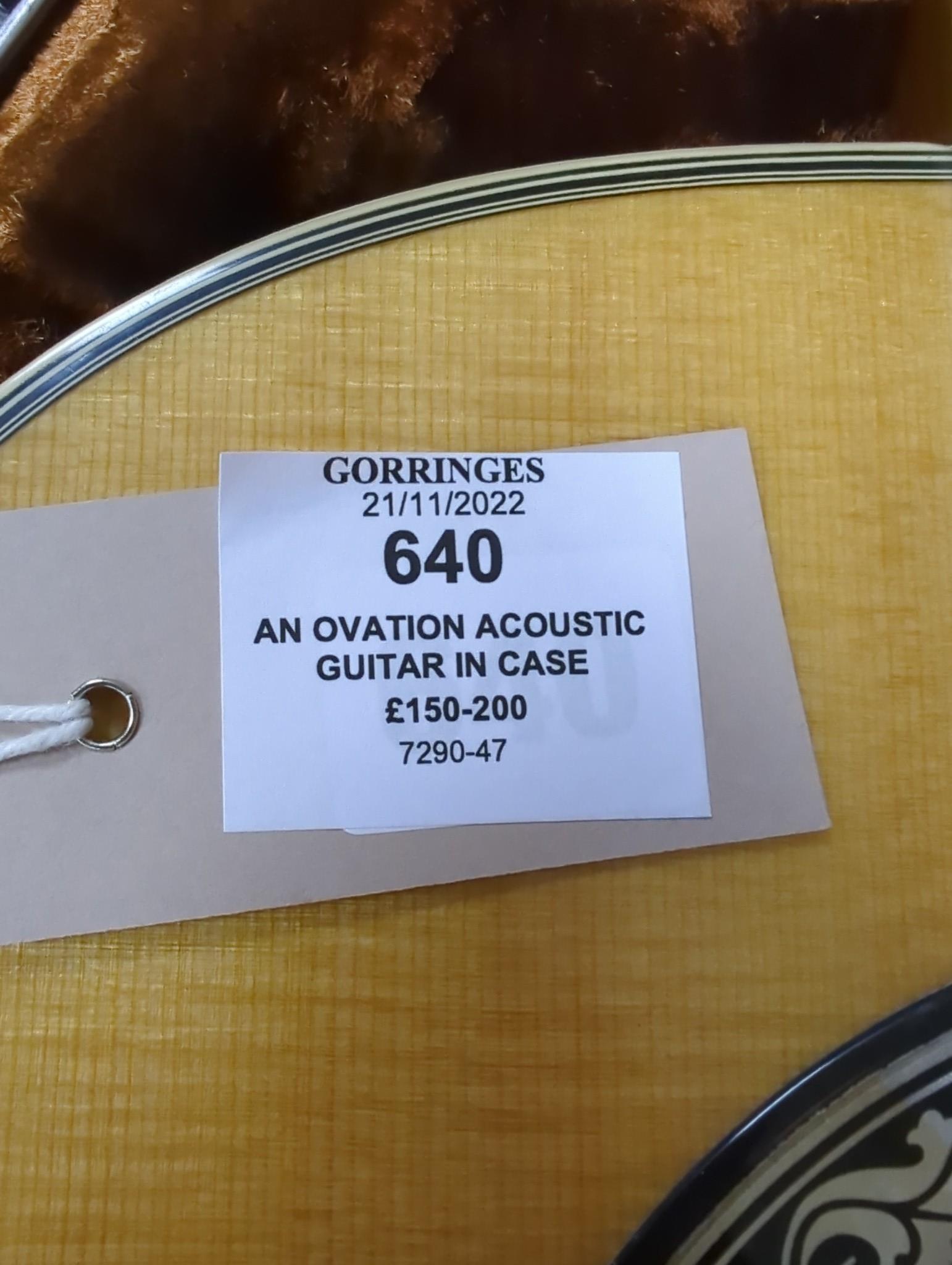 An Ovation acoustic guitar in case